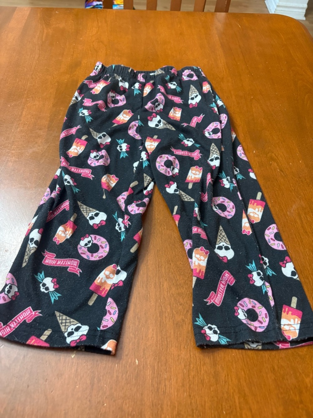 monster high Black Pajama Pants with Pink & Teal Treat Print